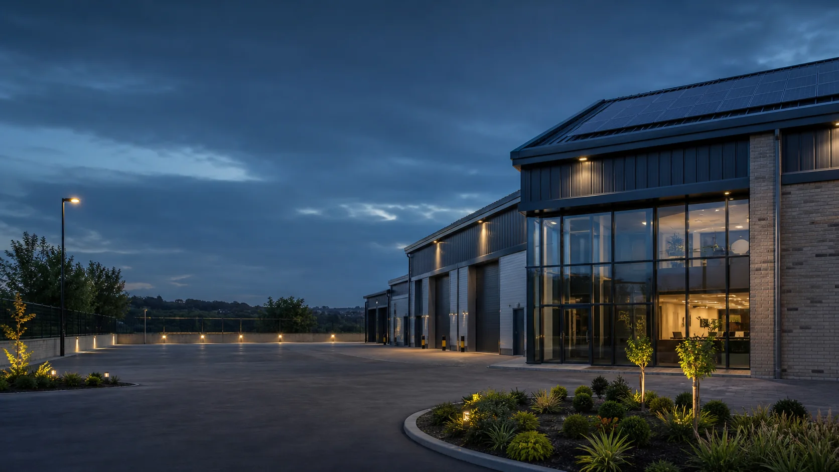 Illustrative coordinated commercial property campus with roof, electrical and energy improvements; not a completed Zamax project